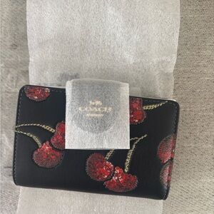 Coach Cherry medium corner zip wallet